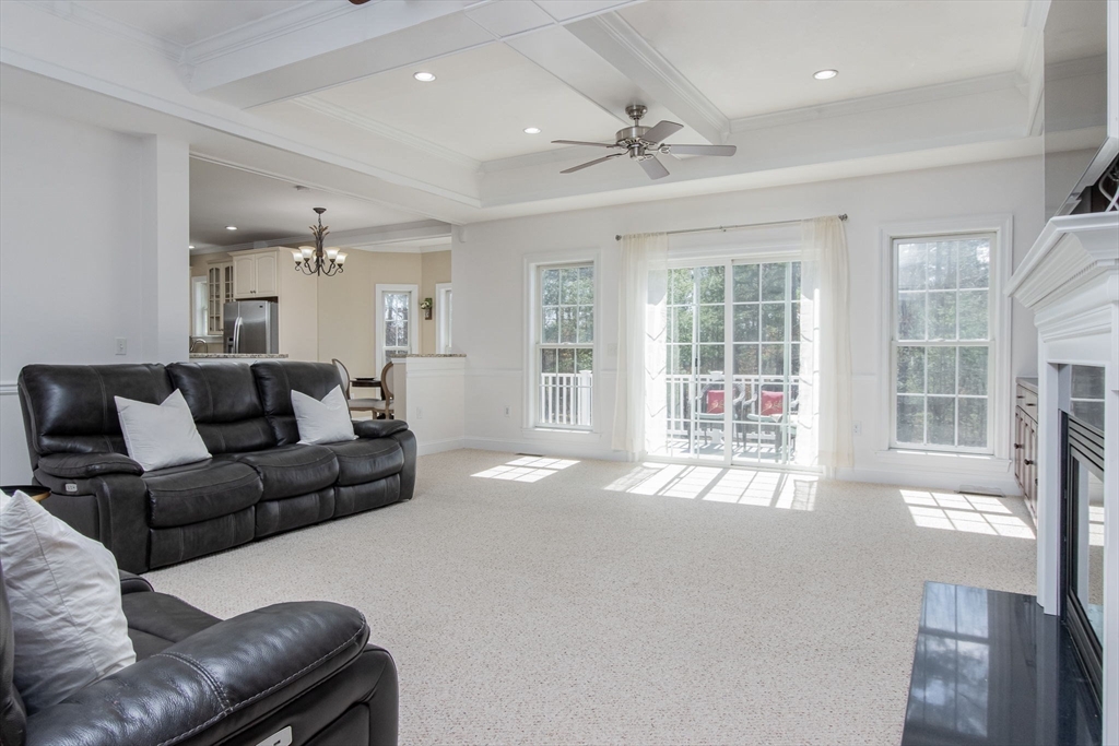 16 Mountain Laurel Road Ayer, MA 01432 - Photo 15 of 39 a living room with furniture and a large window
