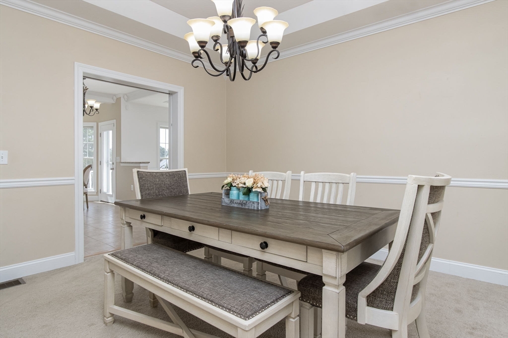 16 Mountain Laurel Road Ayer, MA 01432 - Photo 17 of 39 a view of a dining room with furniture
