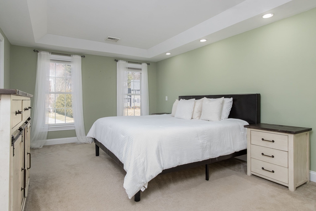 16 Mountain Laurel Road Ayer, MA 01432 - Photo 20 of 39 a bedroom with a bed and a window