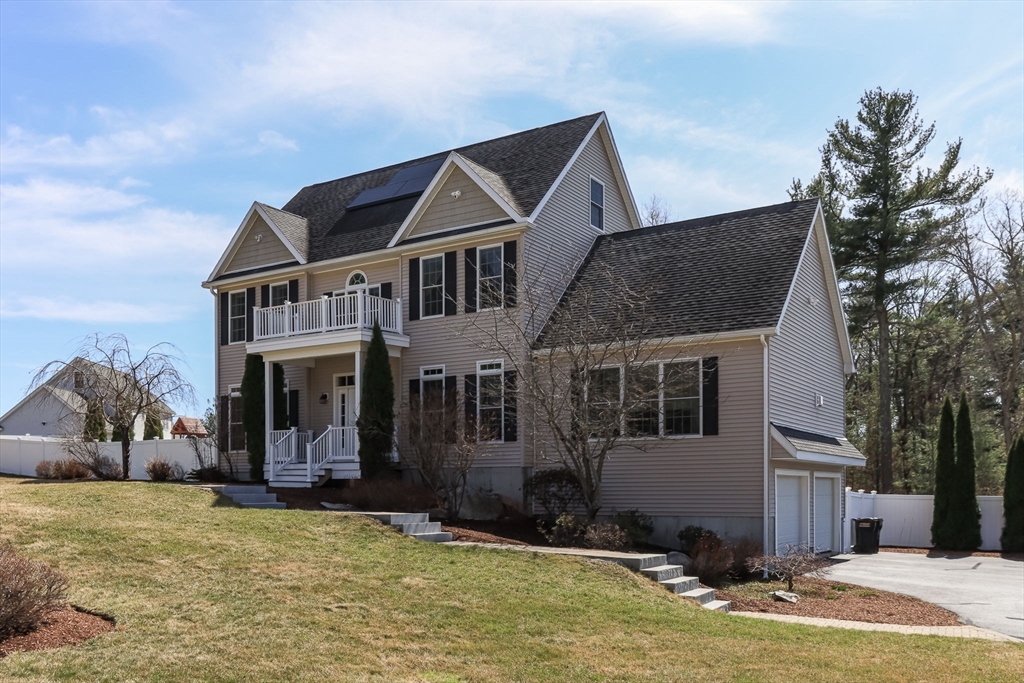 16 Mountain Laurel Road Ayer, MA 01432 - Photo 2 of 39 a front view of house with yard