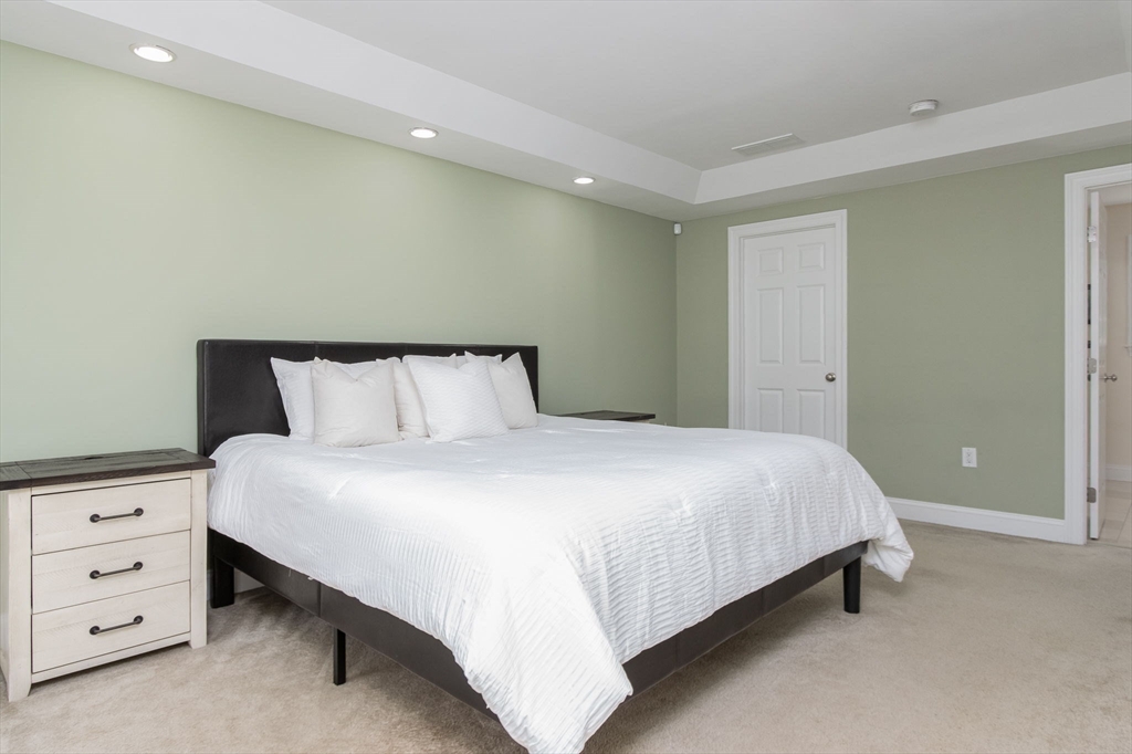 16 Mountain Laurel Road Ayer, MA 01432 - Photo 21 of 39 a bedroom with a bed and a dresser