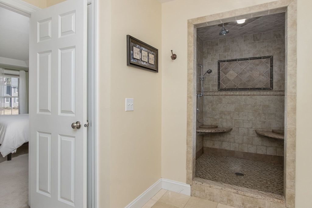 16 Mountain Laurel Road Ayer, MA 01432 - Photo 24 of 39 a bathroom with a glass shower door