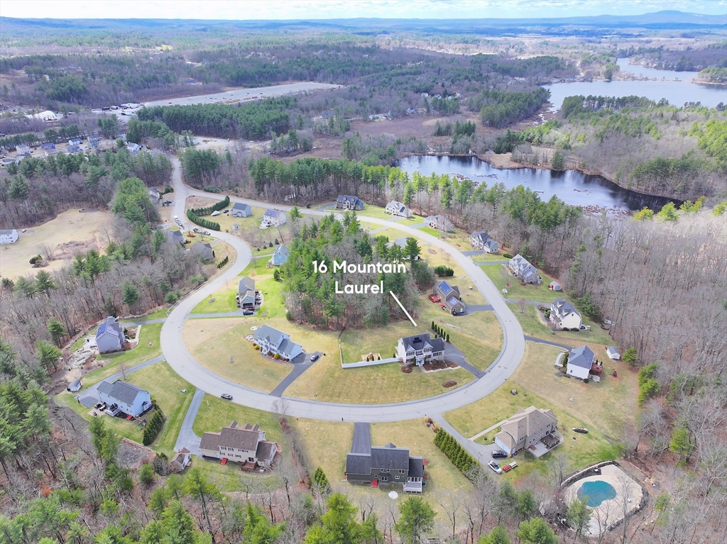 16 Mountain Laurel Road Ayer, MA 01432 - Photo 3 of 39 an aerial view of a house with outdoor seating