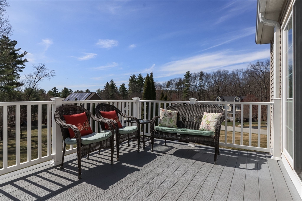 16 Mountain Laurel Road Ayer, MA 01432 - Photo 31 of 39 a view of a chairs on wooden deck