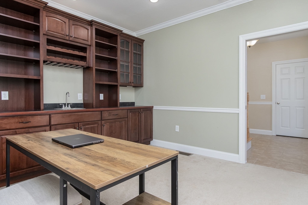 16 Mountain Laurel Road Ayer, MA 01432 - Photo 7 of 39 a kitchen with a table and chairs in it