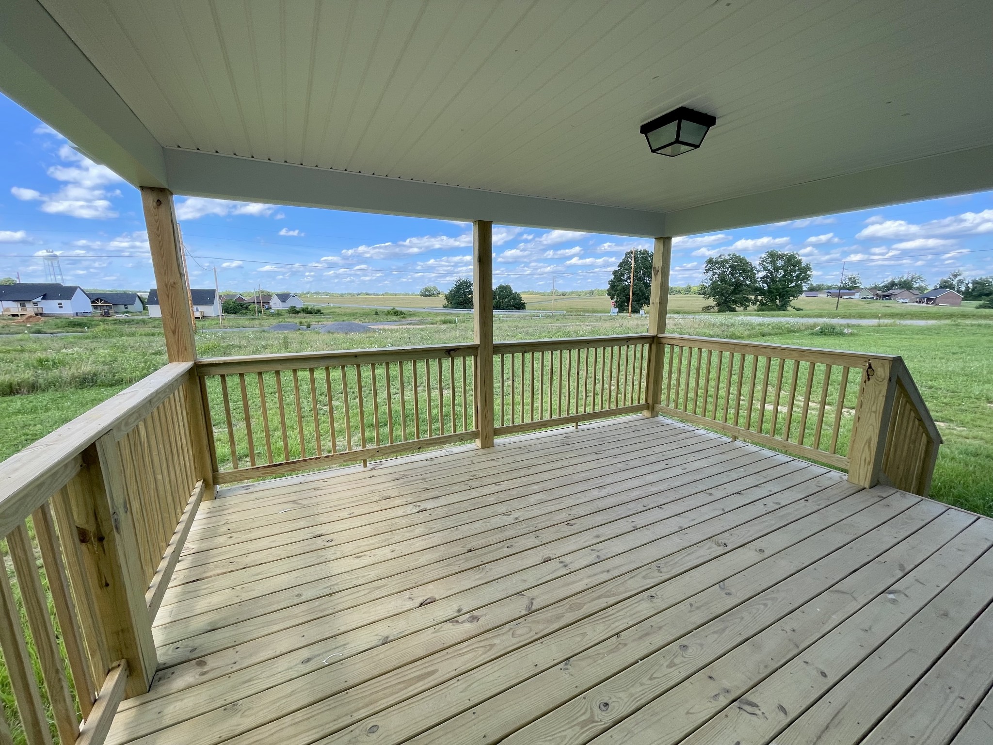 104 Donald Road Lafayette, TN 37083 - Photo 22 of 22 a view of balcony with wooden floor & fence