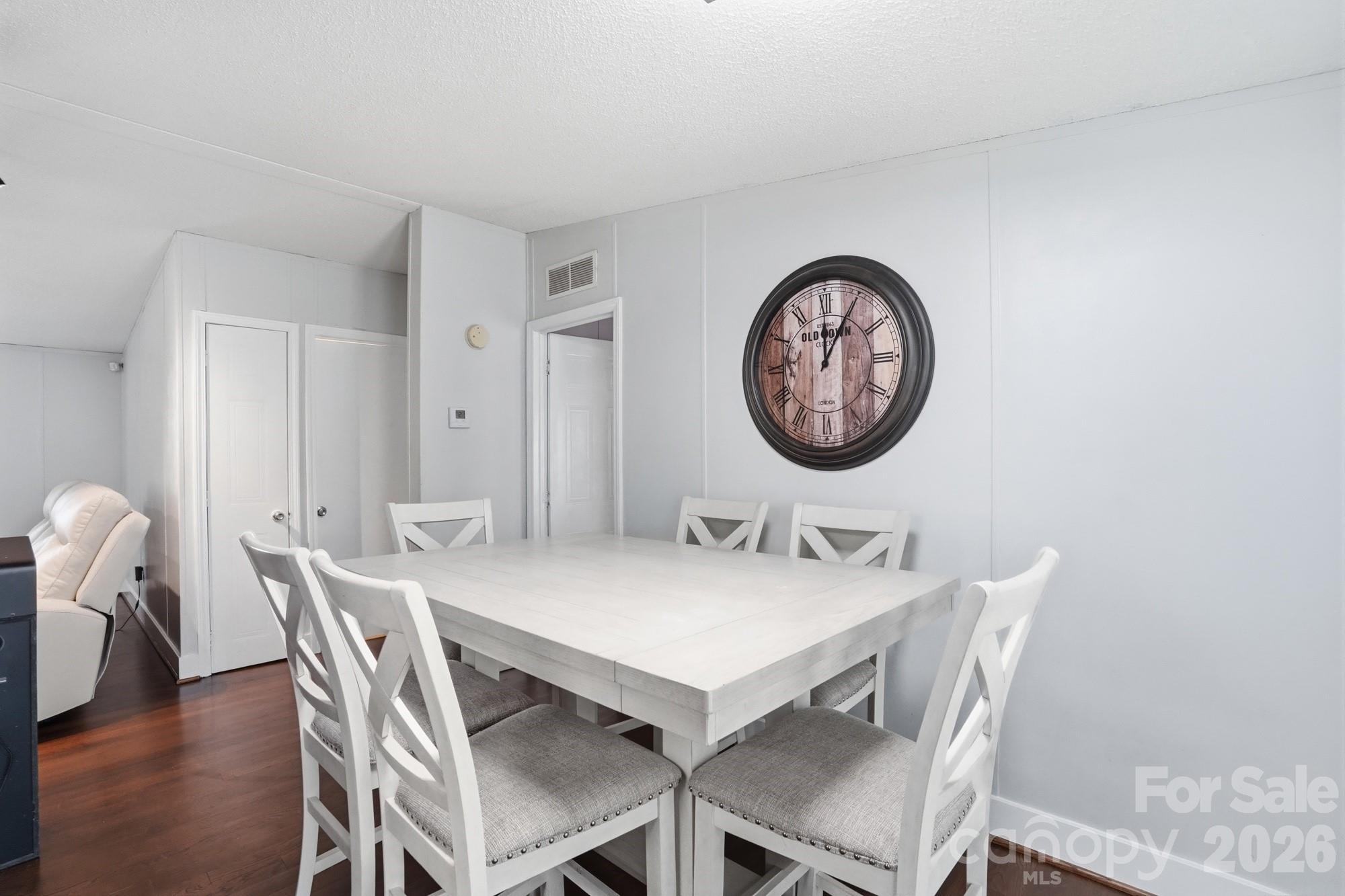 605 Ridgewood Court Mount Holly, NC 28120 - Photo 6 of 32 a view of a dining area with furniture and wooden floor