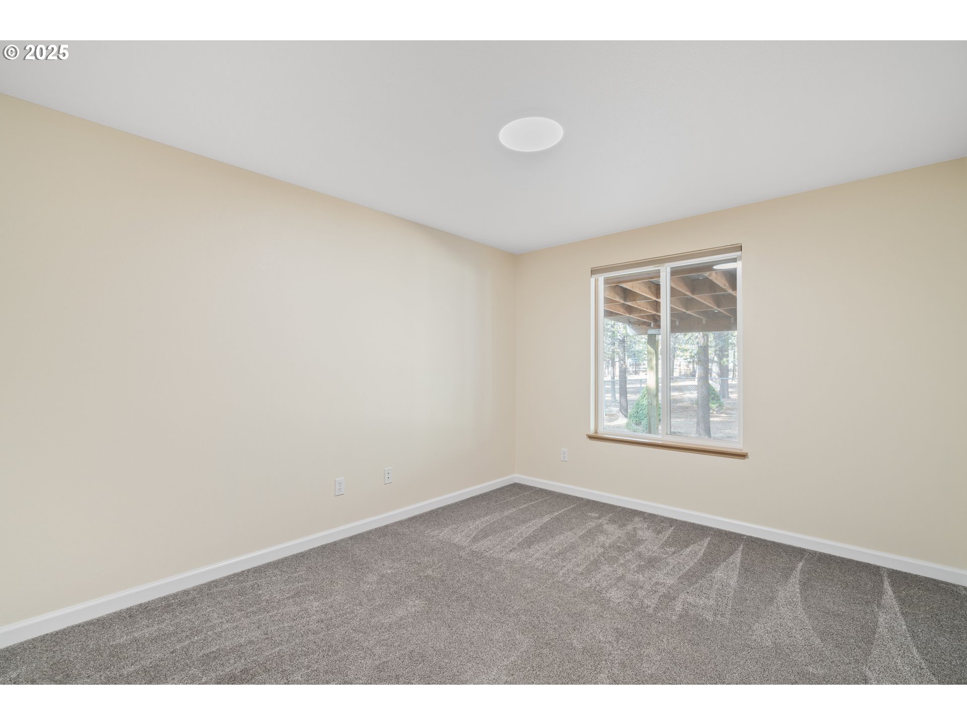 15711 Deedon Lane La Pine, OR 97739 - Photo 12 of 29 an empty room with windows