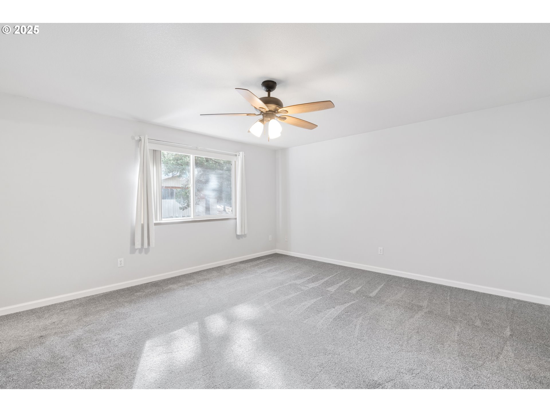 15711 Deedon Lane La Pine, OR 97739 - Photo 15 of 29 a view of an empty room with a window
