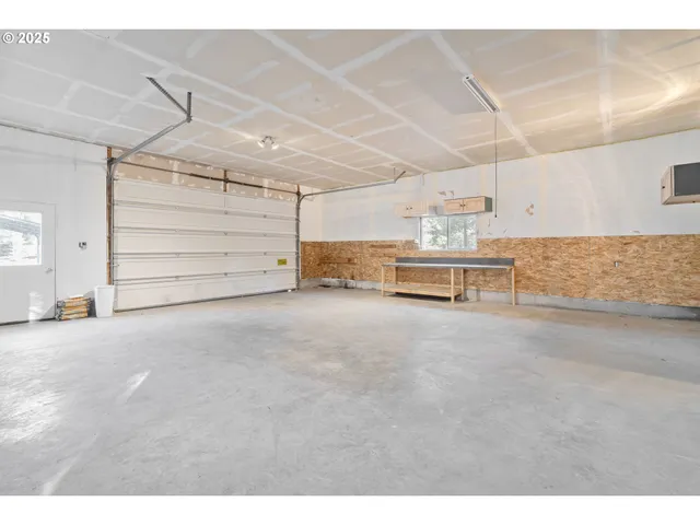 a view of a room with garage and furniture