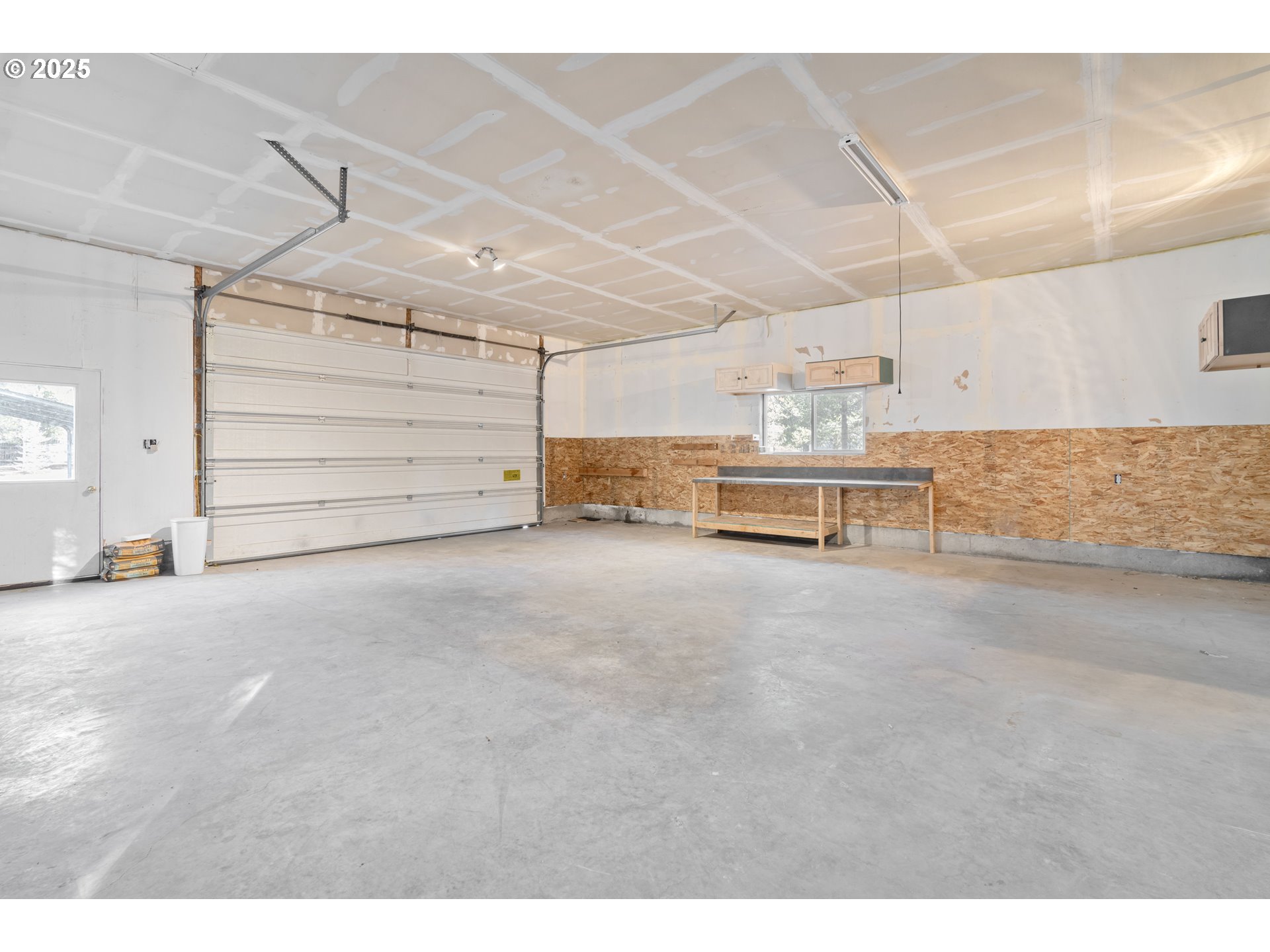 15711 Deedon Lane La Pine, OR 97739 - Photo 20 of 29 a view of a room with garage and furniture