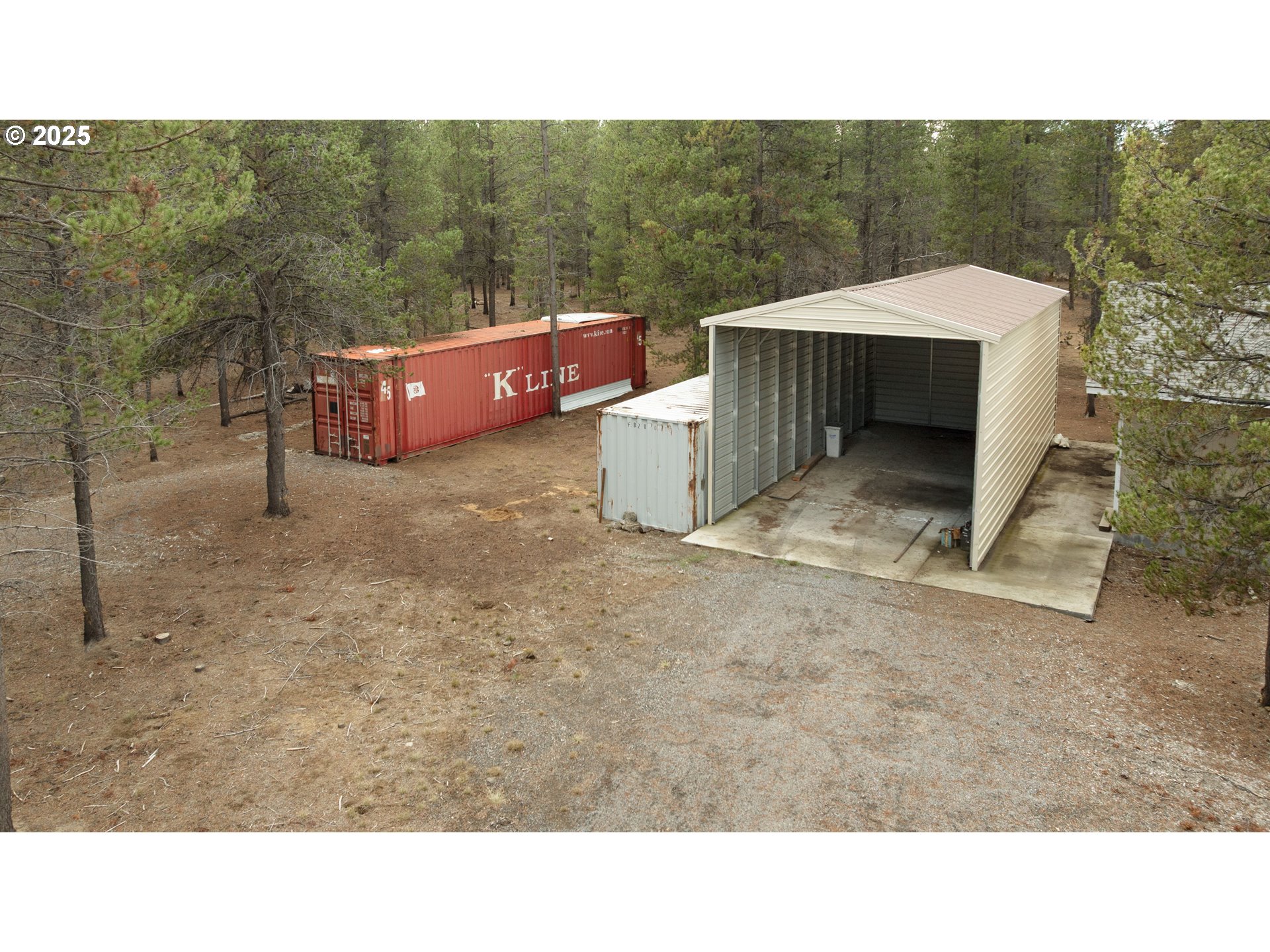 15711 Deedon Lane La Pine, OR 97739 - Photo 23 of 29 a open area with a car park in front of it