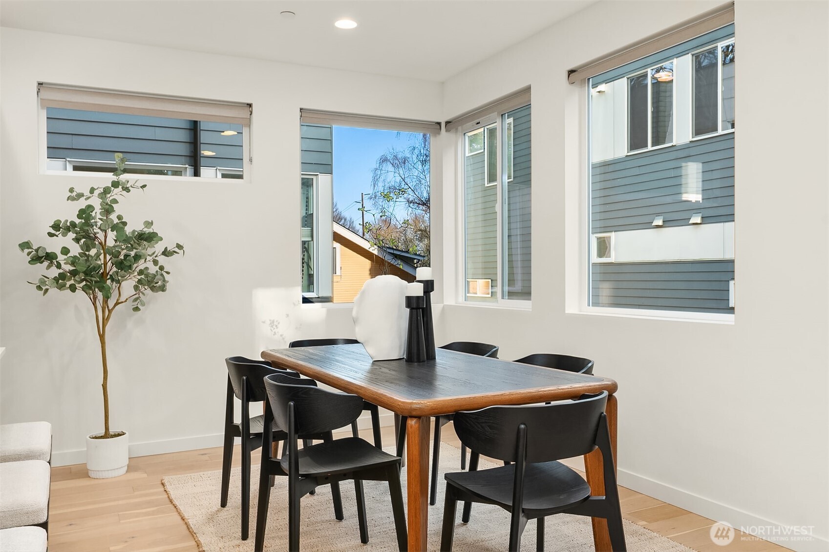 2617 3rd Avenue West Seattle, WA 98119 - Photo 11 of 30 a view of a dining room with furniture and window