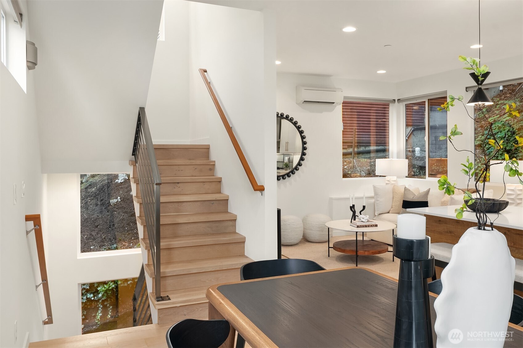 2617 3rd Avenue West Seattle, WA 98119 - Photo 13 of 30 a living room with furniture a rug and white walls