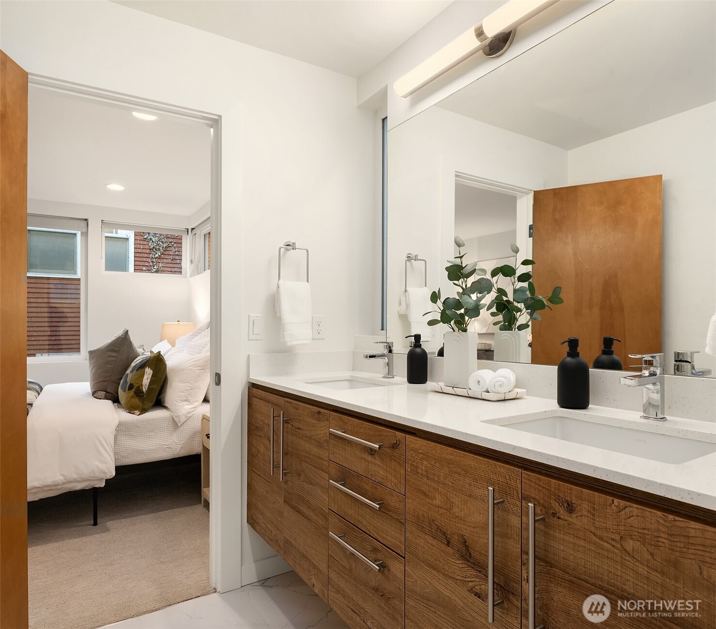2617 3rd Avenue West Seattle, WA 98119 - Photo 26 of 30 a bathroom with a sink double vanity and mirror