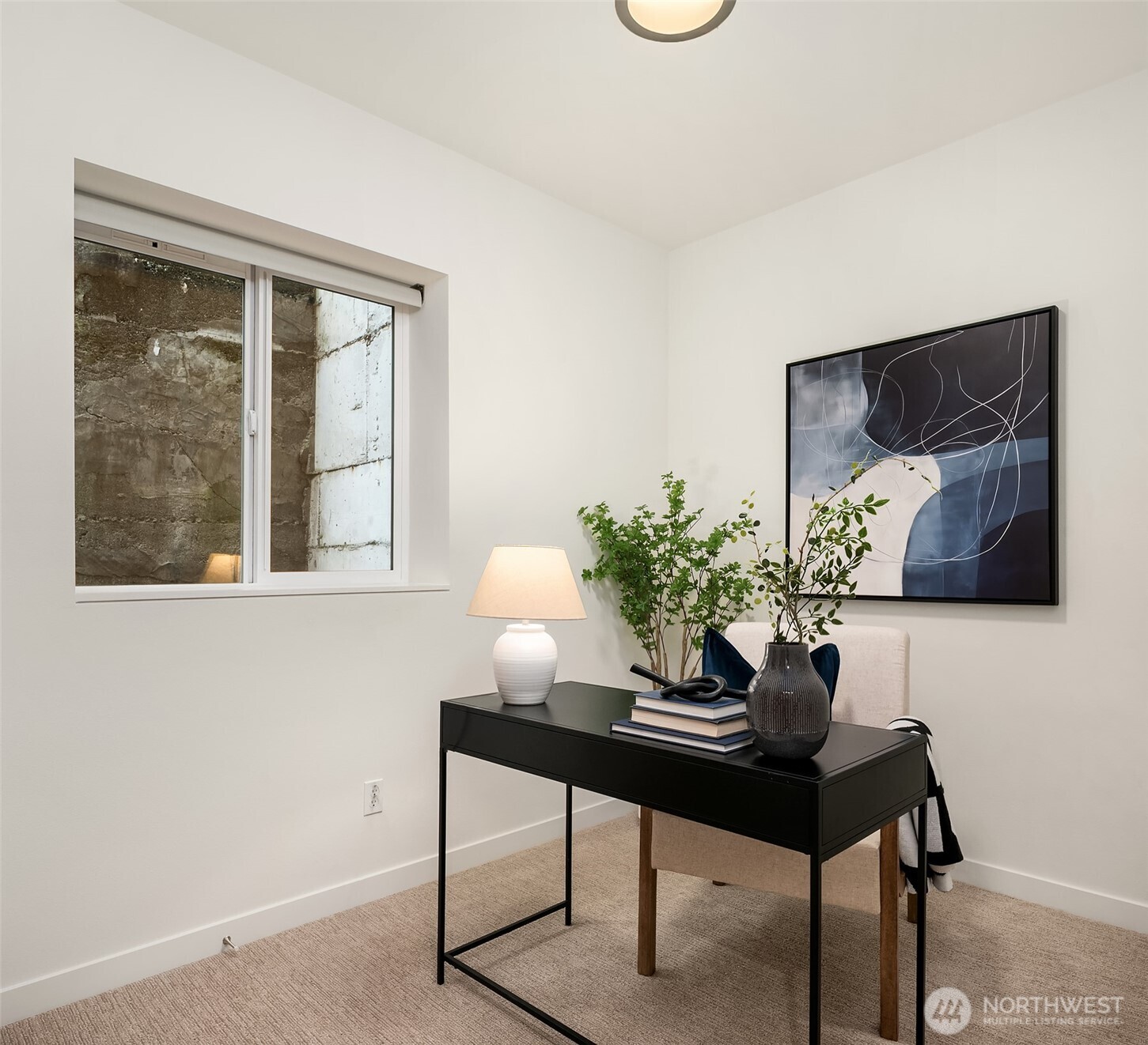 2617 3rd Avenue West Seattle, WA 98119 - Photo 5 of 30 a living room with furniture and a potted plant