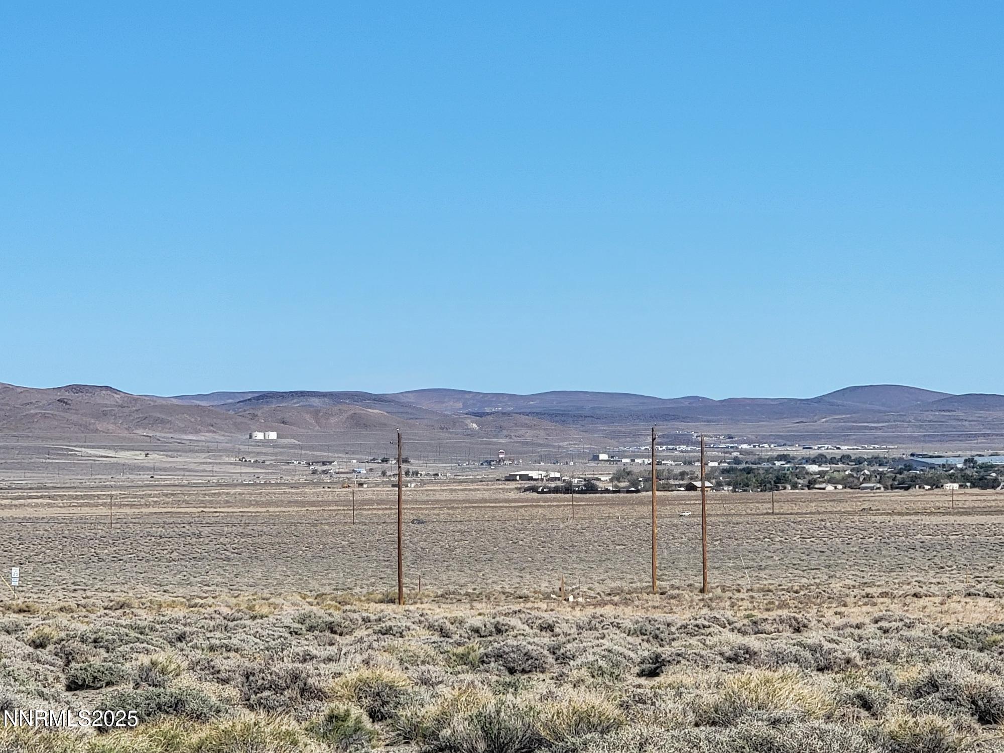 3090 Curtis Avenue Silver Springs, NV 89429 - Photo 5 of 17 a view of lake with mountain
