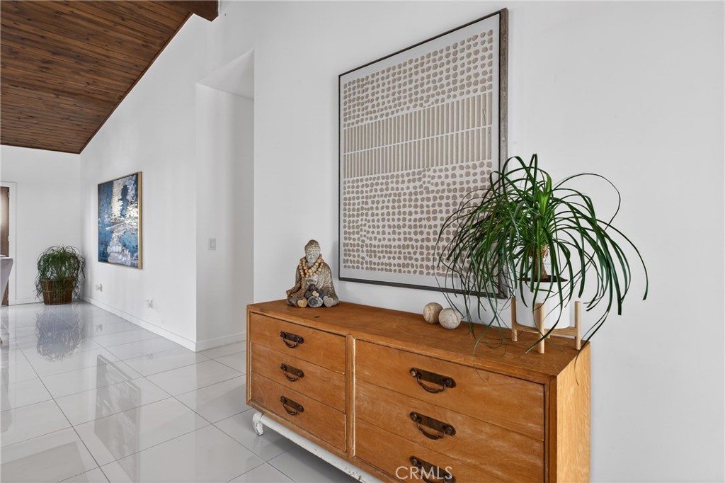 9640 Hoylake Road Desert Hot Springs, CA 92240 - Photo 16 of 46 a room with window and potted plant