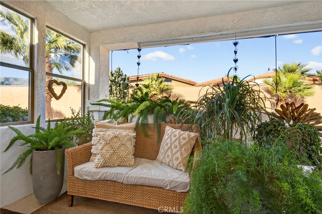 9640 Hoylake Road Desert Hot Springs, CA 92240 - Photo 28 of 46 a living room with furniture