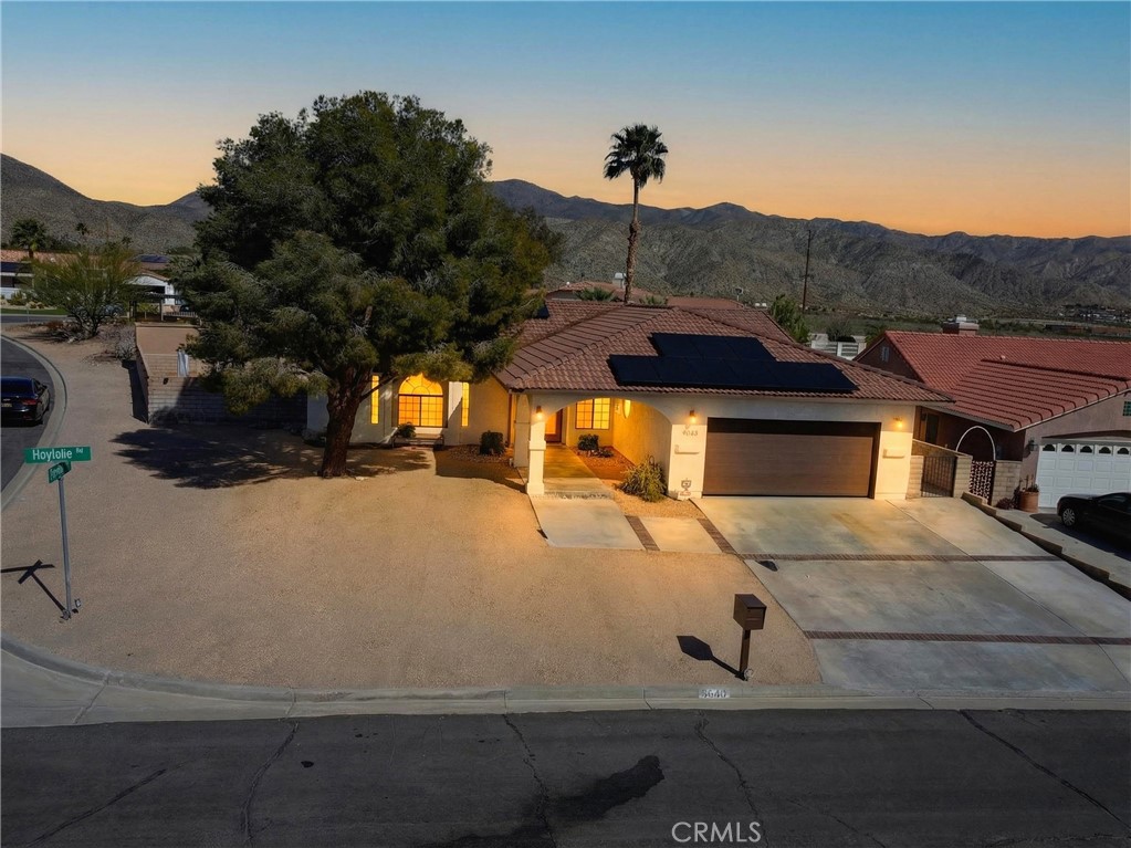 9640 Hoylake Road Desert Hot Springs, CA 92240 - Photo 3 of 46 Front Elevation at Twilight Color Enhanced
Photo color enhanced