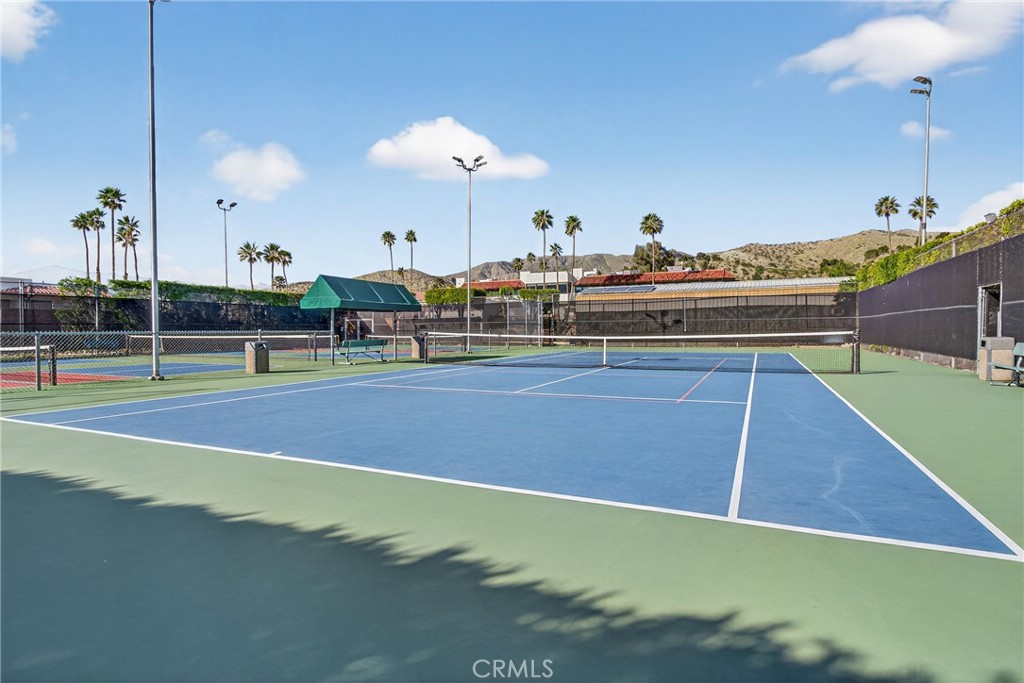 9640 Hoylake Road Desert Hot Springs, CA 92240 - Photo 35 of 46 a room with lots of gym equipment