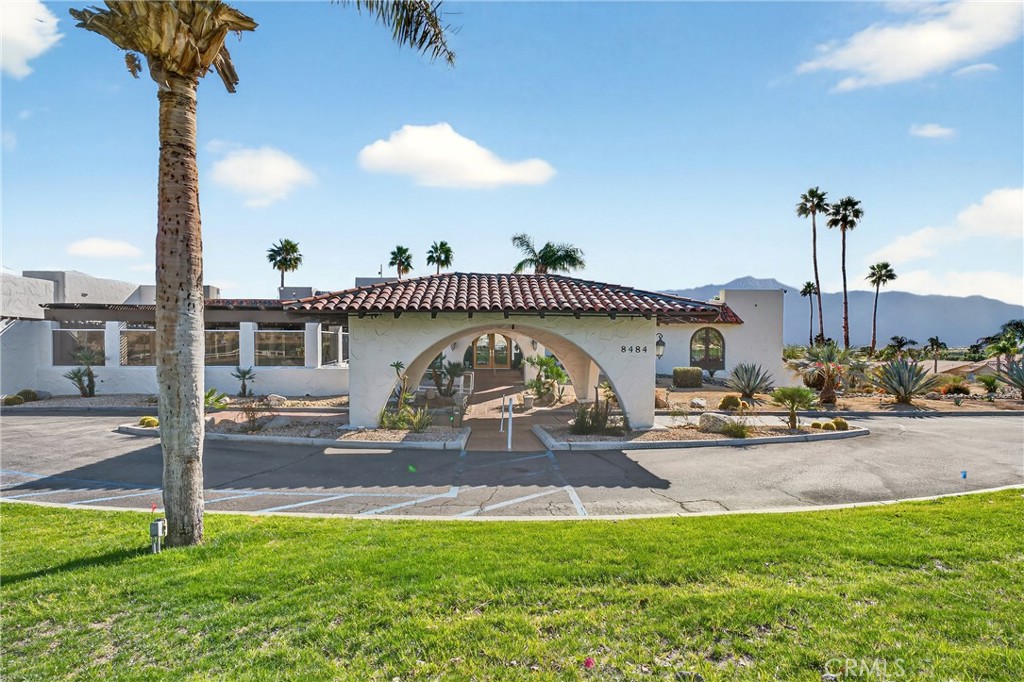 9640 Hoylake Road Desert Hot Springs, CA 92240 - Photo 37 of 46 a view of a swimming pool with a patio