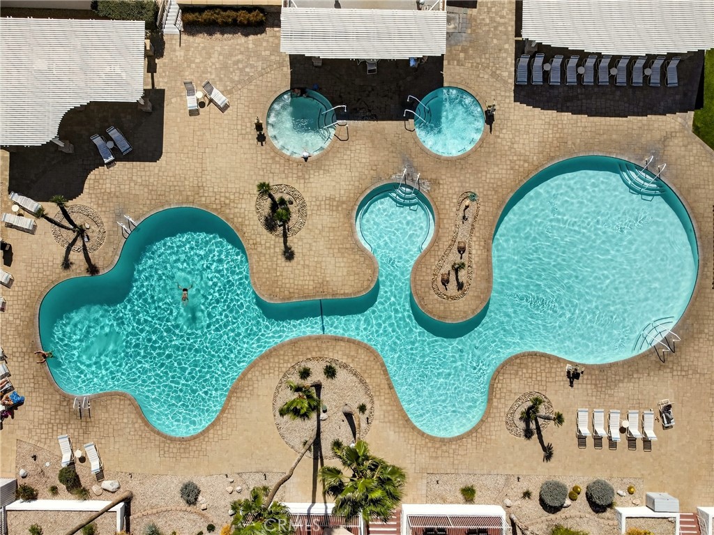 9640 Hoylake Road Desert Hot Springs, CA 92240 - Photo 41 of 46 an aerial view of a table and chairs in the patio