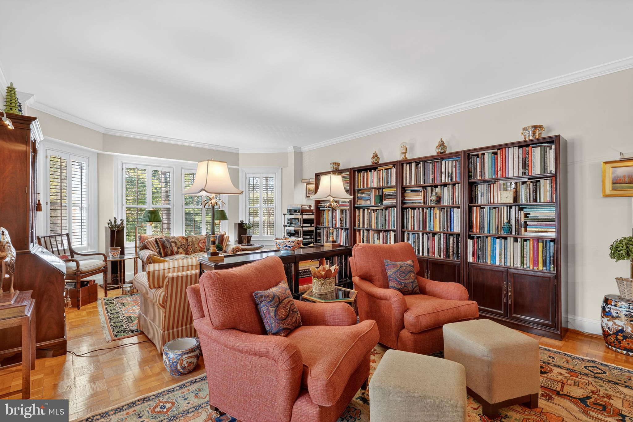 4000 Cathedral Avenue Northwest, Unit 17B Washington, DC 20016 - Photo 16 of 35 a living room with furniture fireplace and a large window