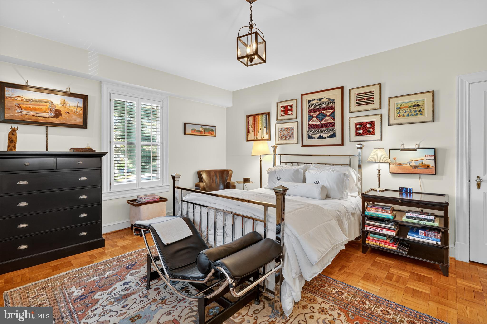 4000 Cathedral Avenue Northwest, Unit 17B Washington, DC 20016 - Photo 24 of 35 a bedroom with furniture and a window