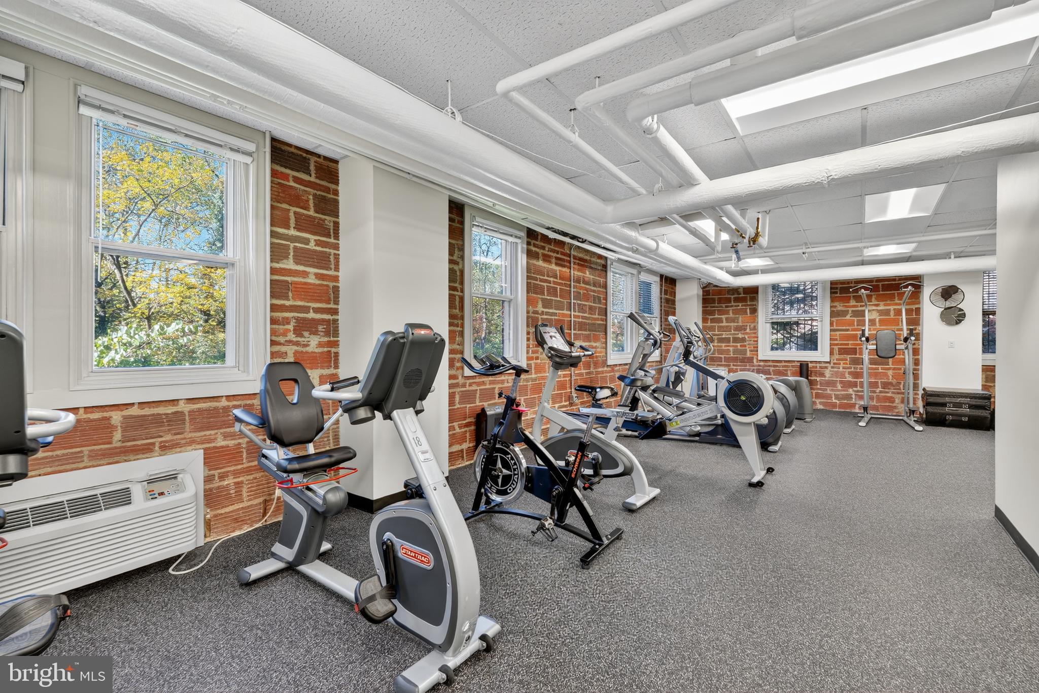4000 Cathedral Avenue Northwest, Unit 17B Washington, DC 20016 - Photo 28 of 35 a view of a room with gym equipment