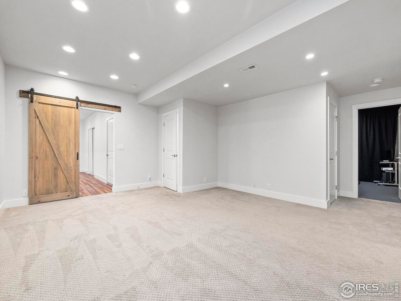 6427 Half Moon Bay Drive Windsor, CO 80550 - Photo 21 of 33 a view of an empty room