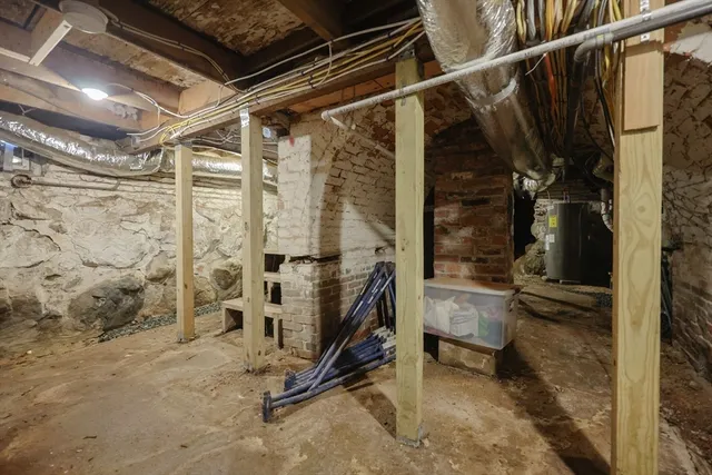 a view of backyard with swimming pool and furniture