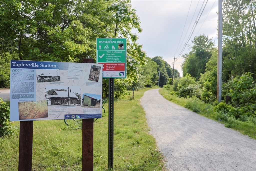 137 High Street Danvers, MA 01923 - Photo 30 of 31 a view of a house with a yard and trees