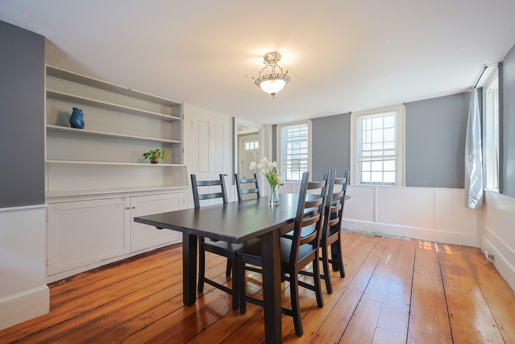 137 High Street Danvers, MA 01923 - Photo 3 of 31 a view of a dining room with furniture and wooden floor