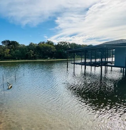 a view of a outdoor space with a lake view