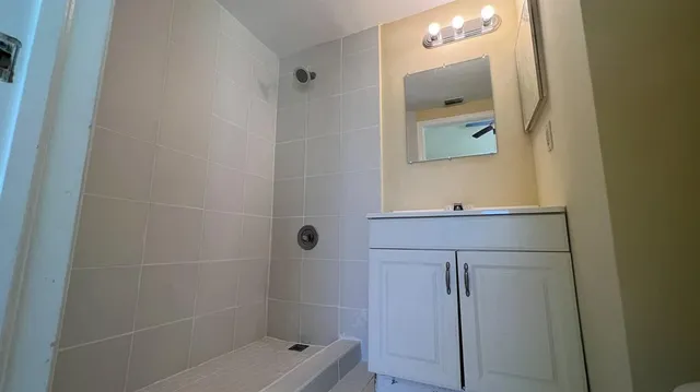 a bathroom with a mirror