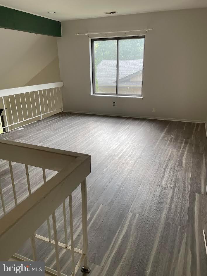 9129 Tulip Grove Road Gaithersburg, MD 20879 - Photo 7 of 12 Loft with space for an office and views.