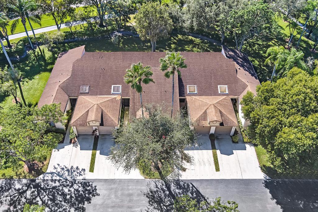 8246 Springview Terrace Boca Raton, FL 33496 - Photo 39 of 53 an aerial view of a house with a yard and garden