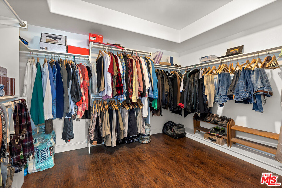 4230 Barrett Road Los Angeles, CA 90032 - Photo 11 of 28 a view of walk in closet with clothes