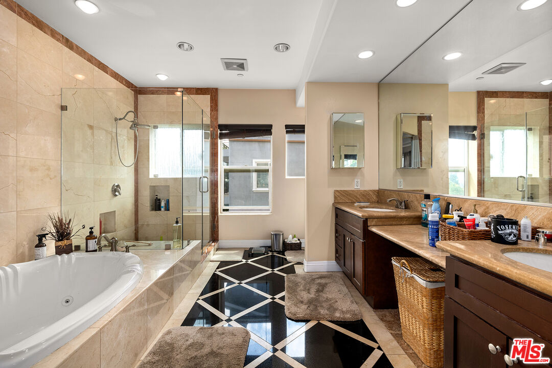 4230 Barrett Road Los Angeles, CA 90032 - Photo 15 of 28 a kitchen with a sink stove and cabinets
