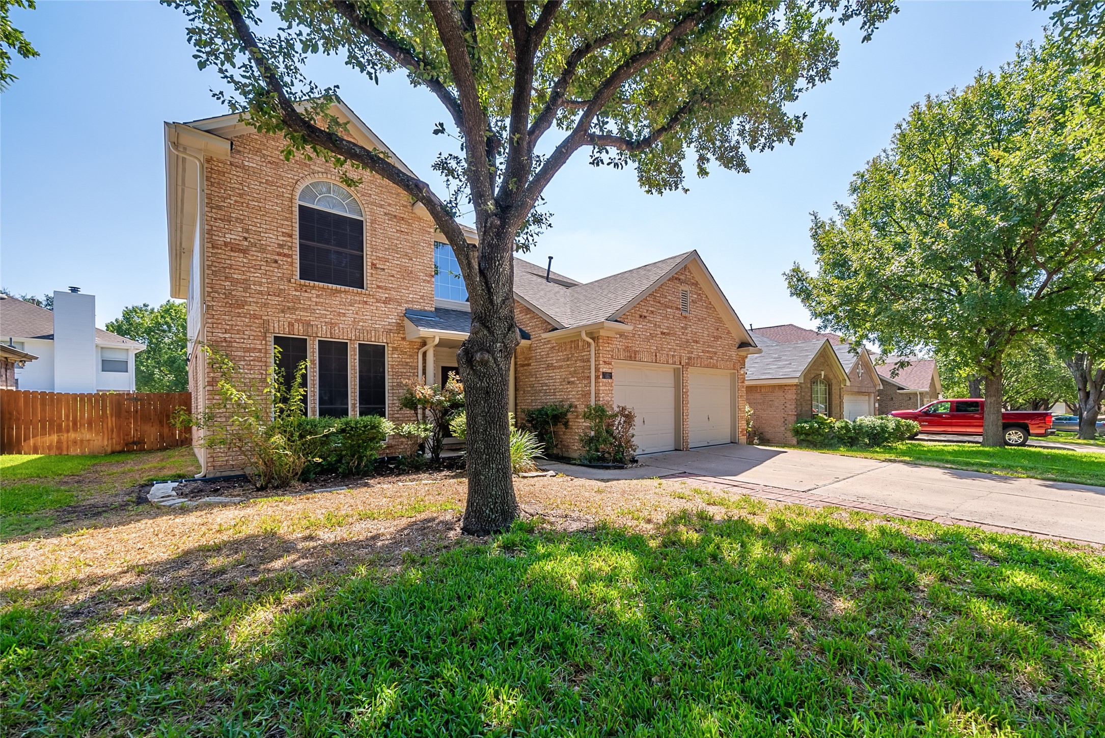 915 Double File Trail Round Rock, TX 78665 - Photo 1 of 32 a front view of a house with a yard and garage