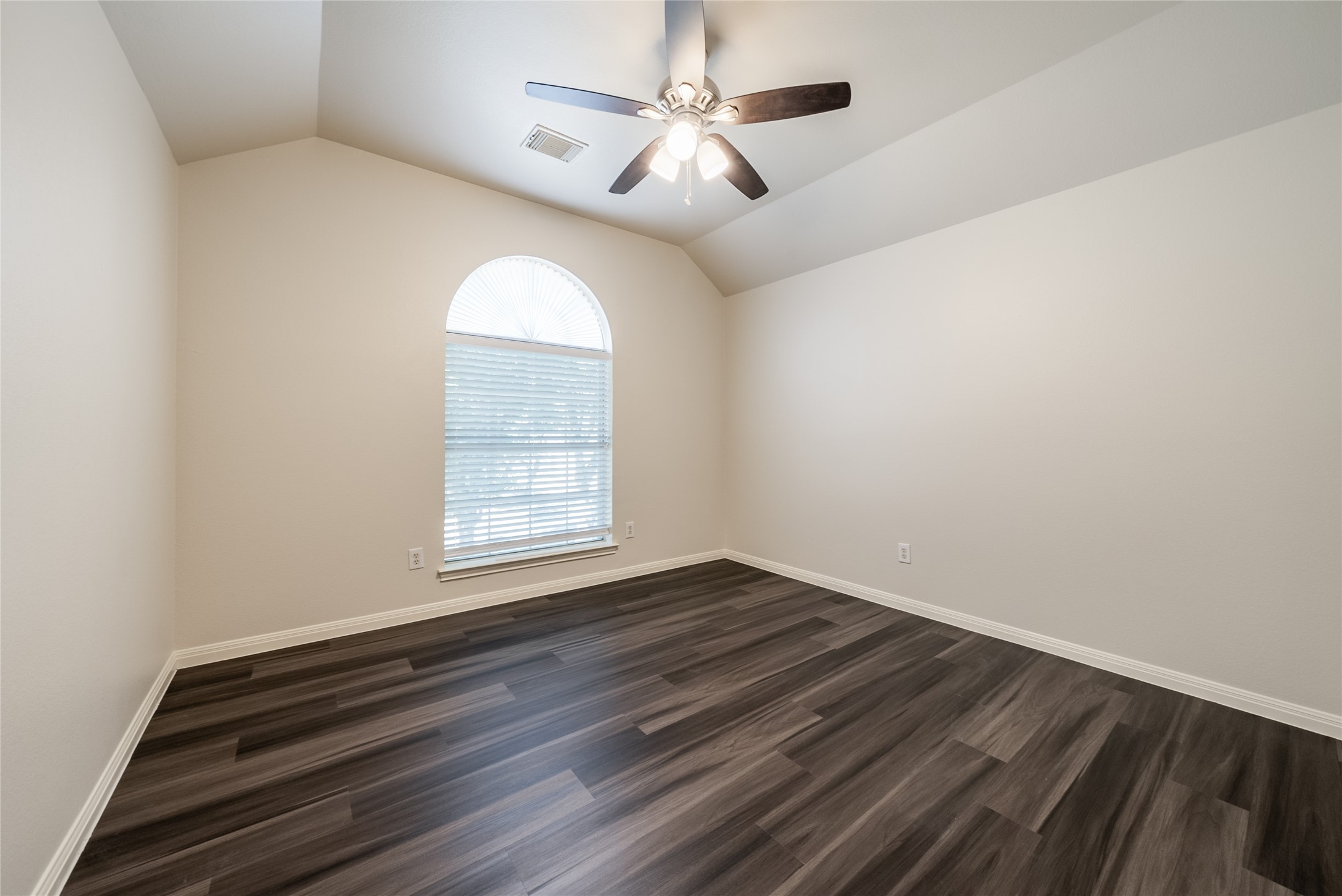915 Double File Trail Round Rock, TX 78665 - Photo 17 of 32 wooden floor in an empty room with a window