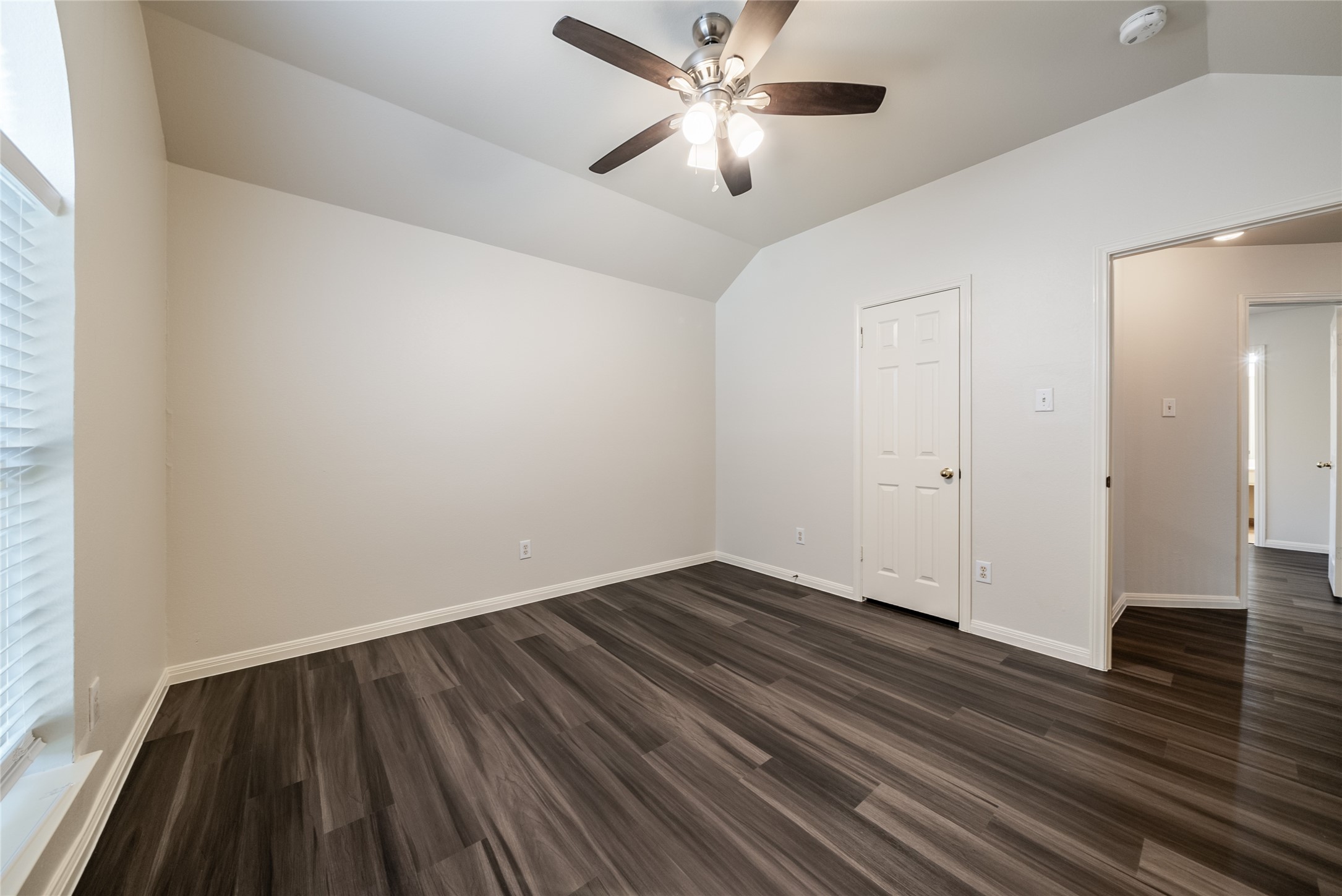 915 Double File Trail Round Rock, TX 78665 - Photo 18 of 32 a view of an empty room with wooden floor