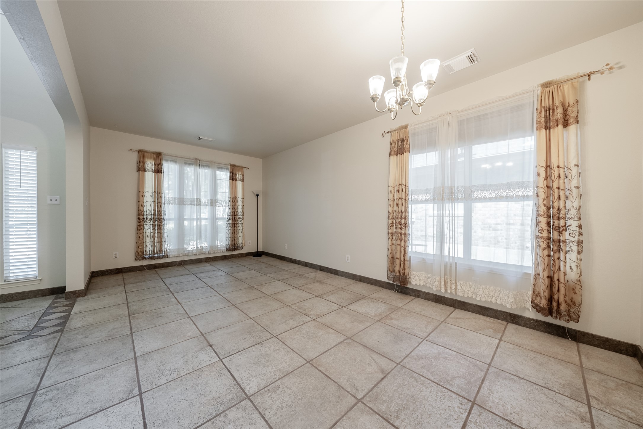 915 Double File Trail Round Rock, TX 78665 - Photo 4 of 32 a view of an empty room with a window
