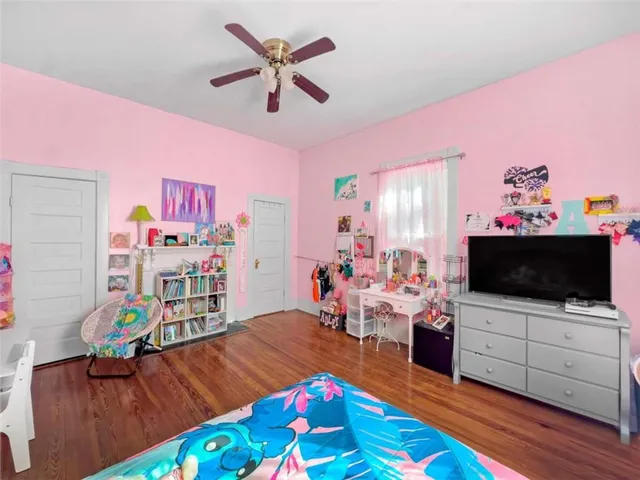 a view of a chair and tables in the patio
