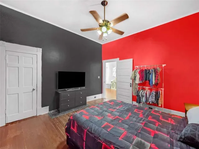 a view of a field with trees in the background