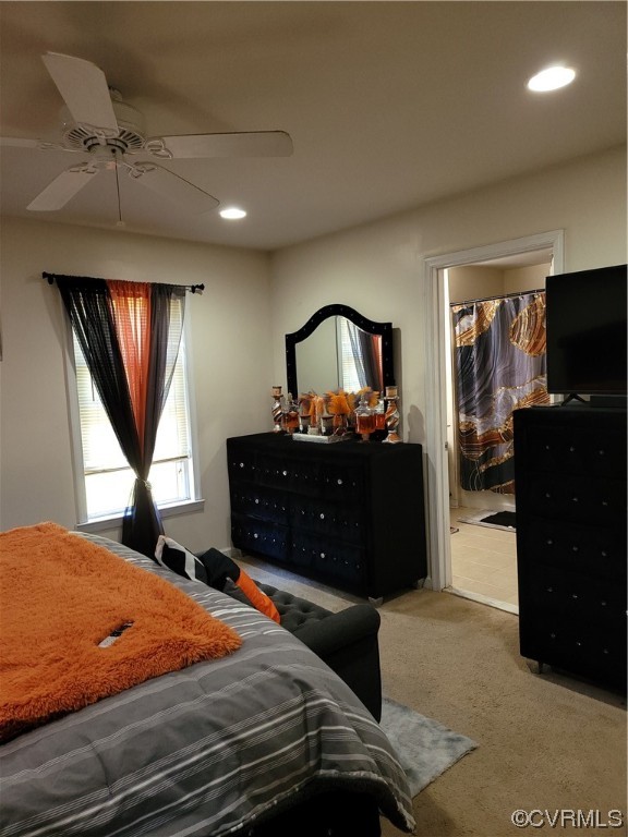 15230 McBryant Road Ruther Glen, VA 22546 - Photo 14 of 22 a bedroom with a bed and a flat tv screen on dresser