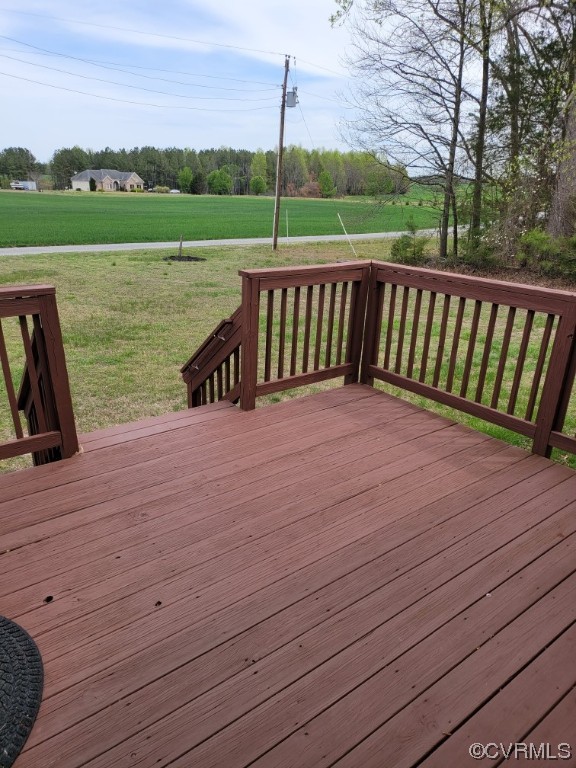 15230 McBryant Road Ruther Glen, VA 22546 - Photo 2 of 22 a view of a wooden deck and lake