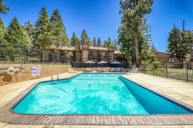 a view of a house with swimming pool