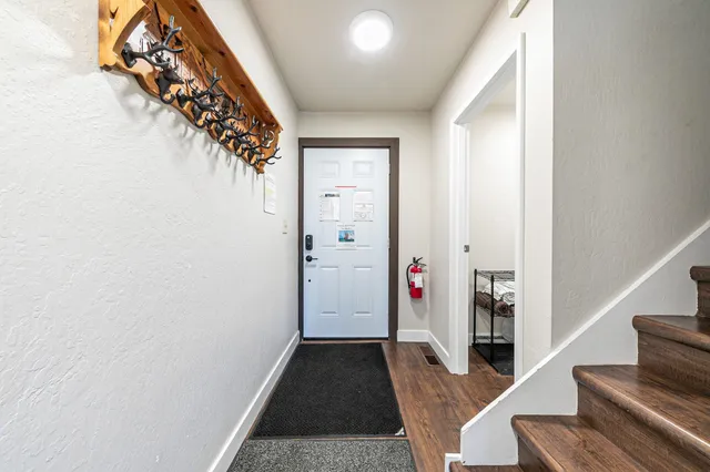 wooden floor with staircase